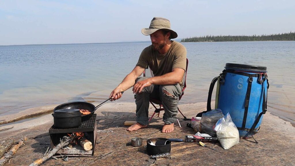 Calem Watson cooking a shore lunch